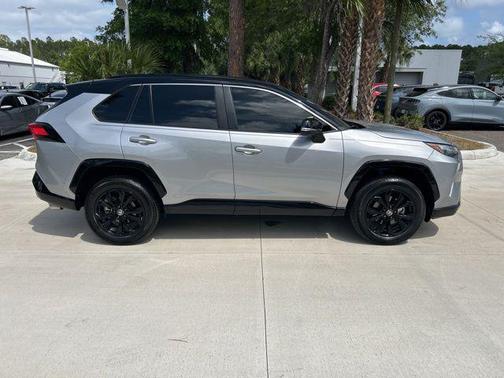 Silver Sky Metallic/Midnight Black Metallic 2023 Toyota RAV4 Hybrid SE