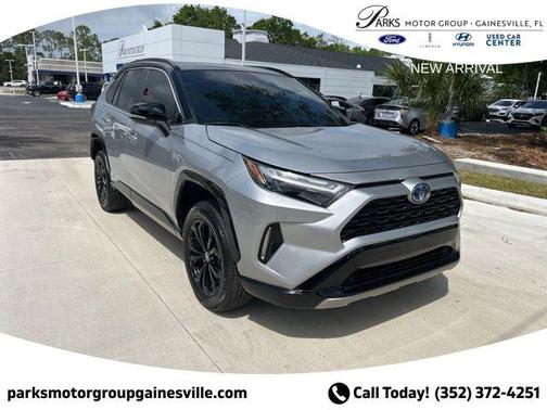 Silver Sky Metallic/Midnight Black Metallic 2023 Toyota RAV4 Hybrid SE