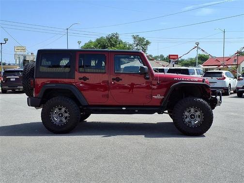 Red 2012 Jeep Wrangler Unlimited Rubicon