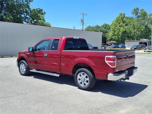 Red 2014 Ford F-150 Lariat