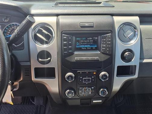 Red 2014 Ford F-150 Lariat