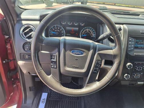 Red 2014 Ford F-150 Lariat
