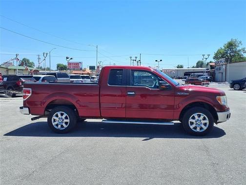 Red 2014 Ford F-150 Lariat