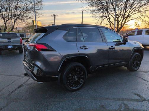 Silver Sky Metallic/Midnight Black Metallic 2023 Toyota RAV4 Hybrid SE