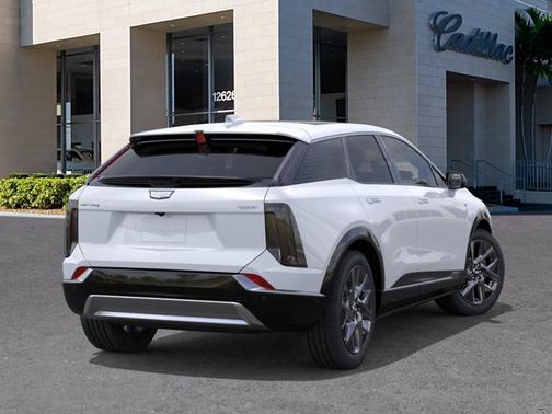 Vibrant White Tricoat 2026 Cadillac OPTIQ Luxury