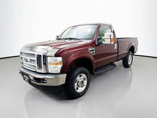 Red 2010 Ford F-250 XLT