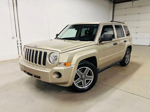 Beige 2009 Jeep Patriot Sport