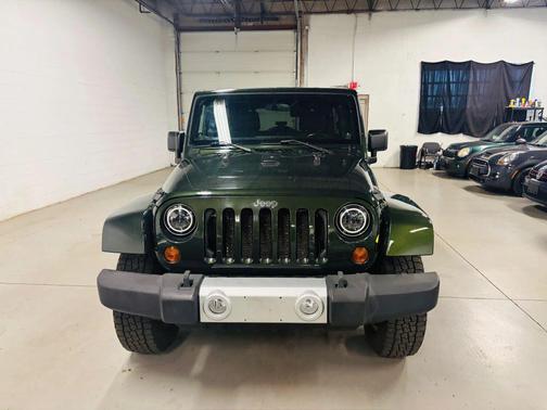 Green 2011 Jeep Wrangler Unlimited Sahara
