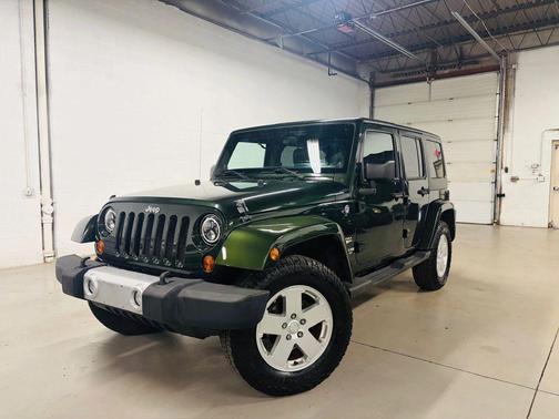 Green 2011 Jeep Wrangler Unlimited Sahara