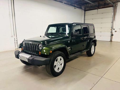 Green 2011 Jeep Wrangler Unlimited Sahara