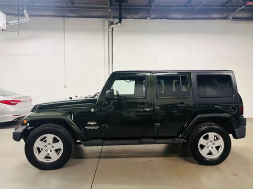 Green 2011 Jeep Wrangler Unlimited Sahara