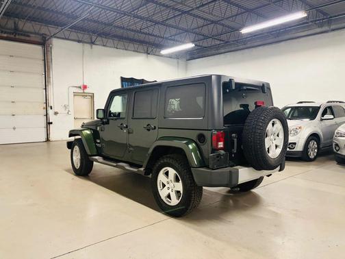 Green 2011 Jeep Wrangler Unlimited Sahara