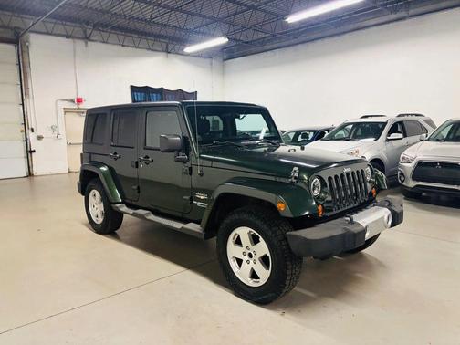 Green 2011 Jeep Wrangler Unlimited Sahara