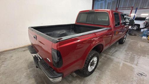 Red 2003 Ford F-250 XL