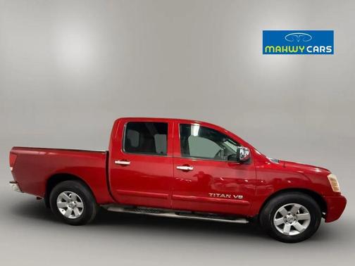 Red 2005 Nissan Titan LE Crew Cab