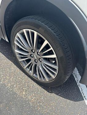 Crystal White Tri-Coat 2024 Cadillac XT4 Premium Luxury