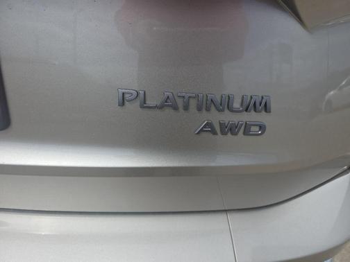 Champagne Silver Metallic 2026 Nissan Rogue Platinum