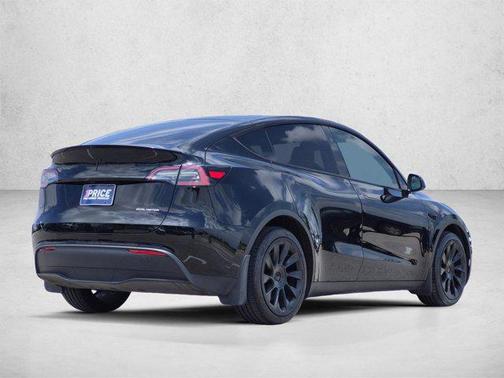 Solid Black 2024 Tesla Model Y Long Range Dual Motor All-Wheel Drive