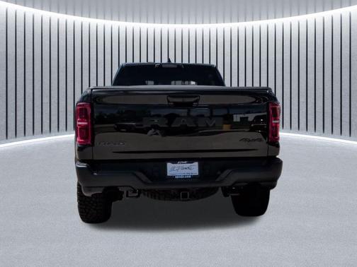 Diamond Black Crystal Pearlcoat 2026 RAM 1500 RHO Crew Cab 4x4 5'7' Box