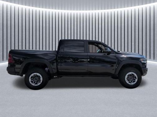 Diamond Black Crystal Pearlcoat 2026 RAM 1500 RHO Crew Cab 4x4 5'7' Box