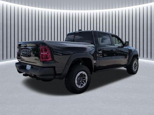 Diamond Black Crystal Pearlcoat 2026 RAM 1500 RHO Crew Cab 4x4 5'7' Box