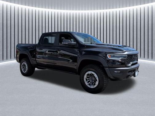 Diamond Black Crystal Pearlcoat 2026 RAM 1500 RHO Crew Cab 4x4 5'7' Box