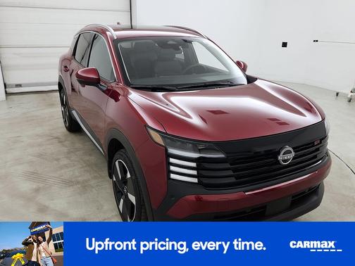 Red 2025 Nissan Kicks SR