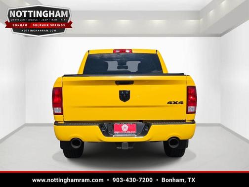 Yellow 2019 RAM 1500 Classic Express