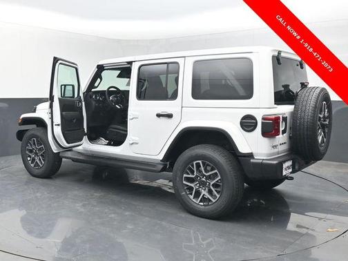 Bright White Clearcoat 2026 Jeep Wrangler 4-Door Sahara 4x4