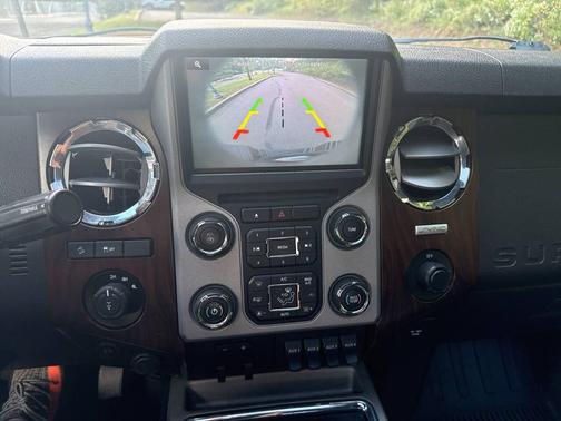 Red 2016 Ford F-250 Lariat