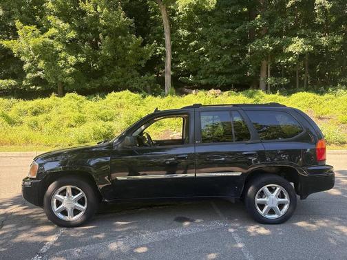 Black 2009 GMC Envoy SLT 4x4 4dr SUV