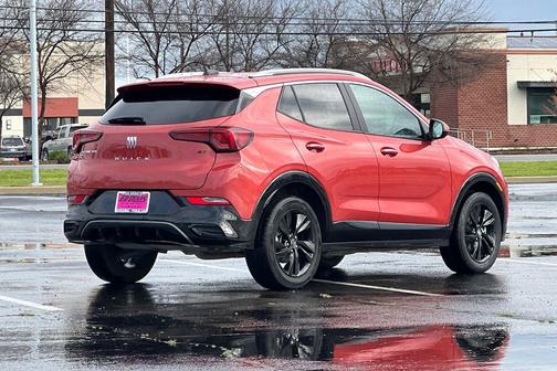 Sunrise Red Metallic 2024 Buick Encore GX Sport Touring