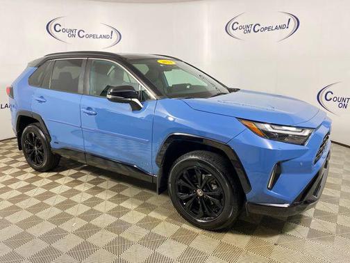 Midnight Black Metallic 2024 Toyota RAV4 Hybrid SE