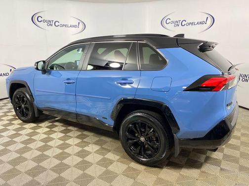 Midnight Black Metallic 2024 Toyota RAV4 Hybrid SE