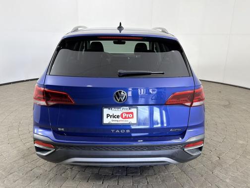 Dusk Blue Metallic 2023 Volkswagen Taos SE 4MOTION