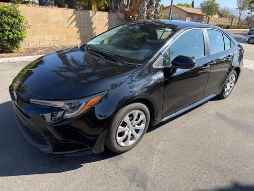 Midnight Black Metallic 2025 Toyota Corolla LE