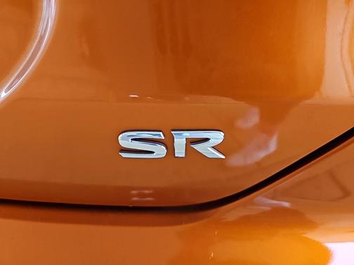 Monarch Orange Metallic/Super Black 2023 Nissan Kicks SR