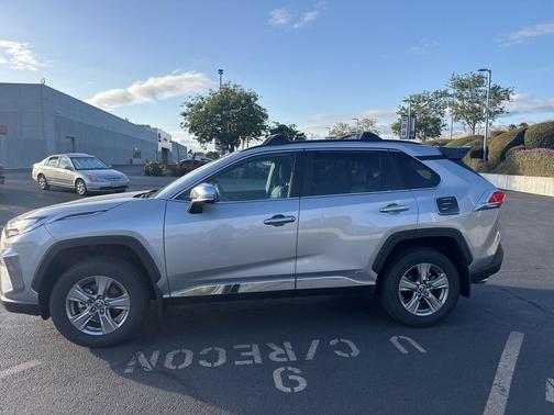 Silver Sky Metallic 2024 Toyota RAV4 Hybrid LE