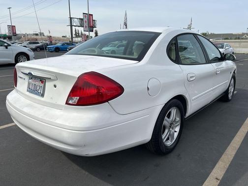 Vibrant White Clearcoat 2000 Ford Taurus SEL