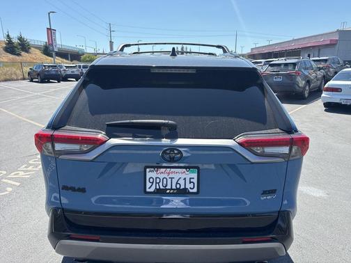 Cavalry Blue/Midnight Black Metallic 2025 Toyota RAV4 Hybrid SE