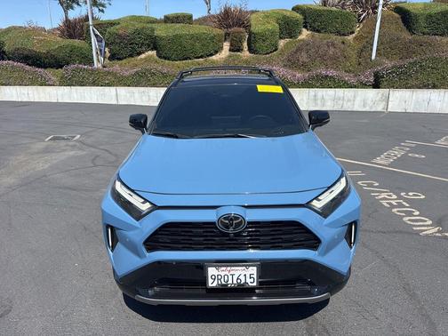 Cavalry Blue/Midnight Black Metallic 2025 Toyota RAV4 Hybrid SE