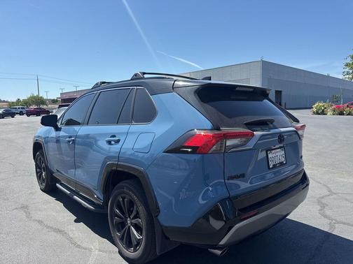 Cavalry Blue/Midnight Black Metallic 2025 Toyota RAV4 Hybrid SE
