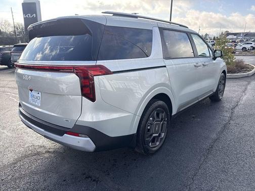 Ivory Silver 2026 Kia Carnival Hybrid EX