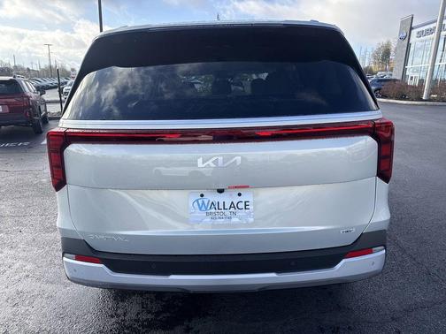 Ivory Silver 2026 Kia Carnival Hybrid EX