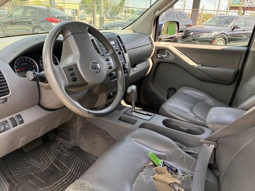 Black 2010 Nissan Frontier LE
