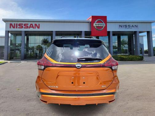 Monarch Orange Metallic/Super Black 2023 Nissan Kicks SR