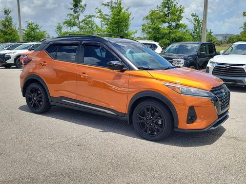 Monarch Orange Metallic/Super Black 2023 Nissan Kicks SR