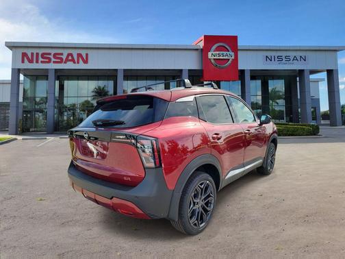 Scarlet Ember Tintcoat 2026 Nissan Kicks SR