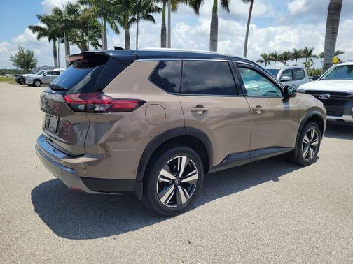 Baja Storm Metallic/Super Black 2024 Nissan Rogue SL