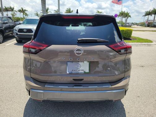 Baja Storm Metallic/Super Black 2024 Nissan Rogue SL